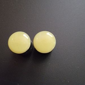 Pale yellow faux plugs